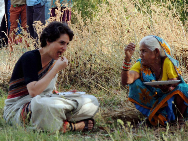 Priyanka Vadra shares meal with a village woman