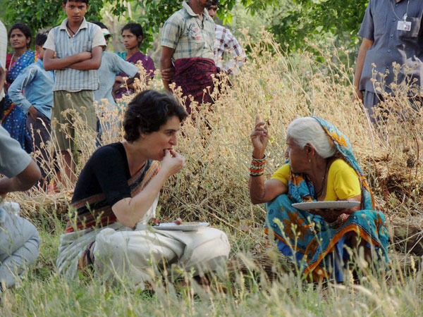 Priyanka Vadra shares meal with a village woman