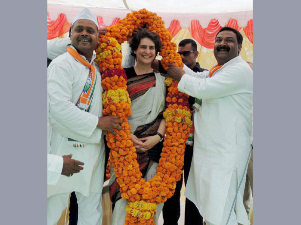 Priyanka Vadra is garlanded during an election campaign