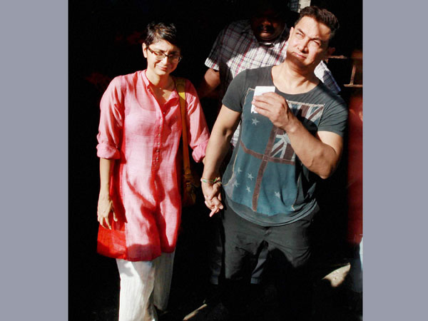 Amir Khan with his wife Kiran Rao after casting their vote