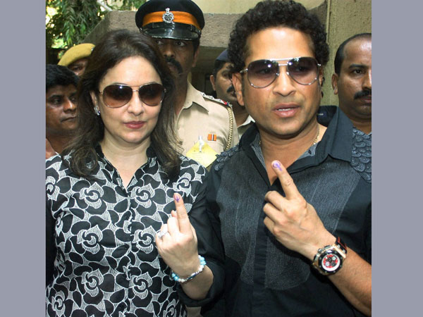 Sachin Tendulkar with wife Anjali Tendulkar showing their inked finger