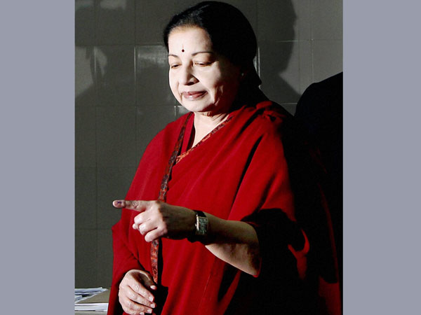 Jayalalithaa shows her inked finger after casting her vote