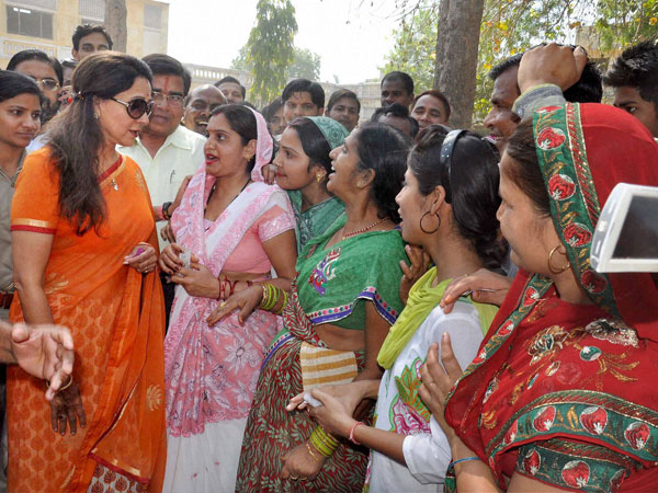 Actress & BJP candidate Hemamalini interacts with voters