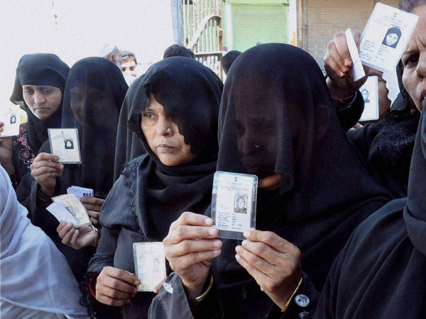 Muslim woman voters standing in a queue