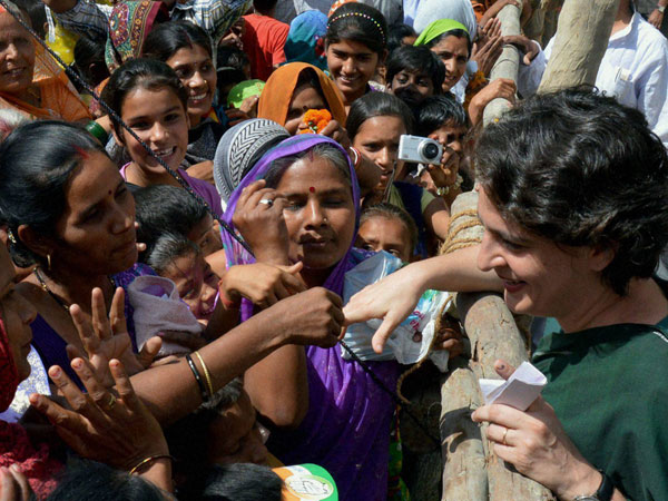 Priyanka Vadra interacts with women during an election campaign