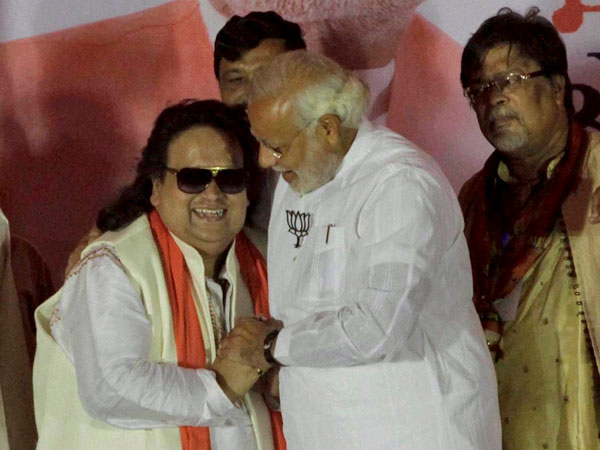 Narendra Modi hugs Bollywood musician and party candidate Bappi Lahiri