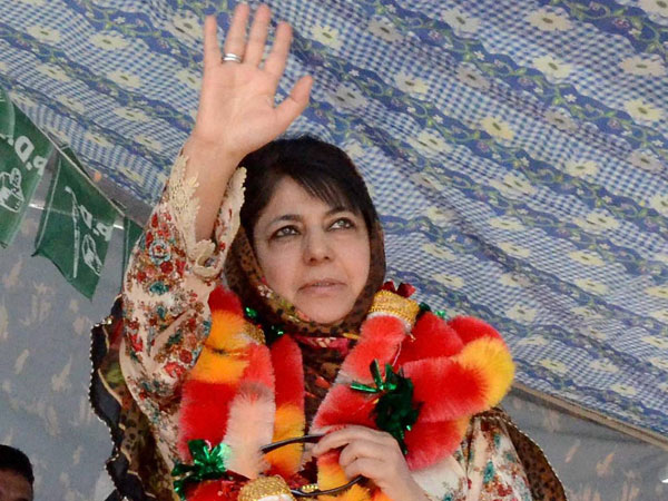 Mehbooba Mufti waves during an election rally