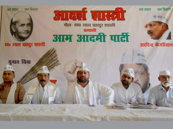 Aadarsh Shastri with party workers at an election meeting