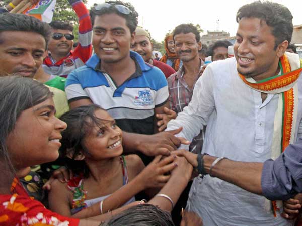 Anupam Hazra meets with the villagers during his election campaign