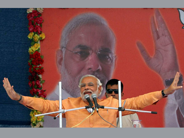 Narendra Modi addresses an election campaign rally