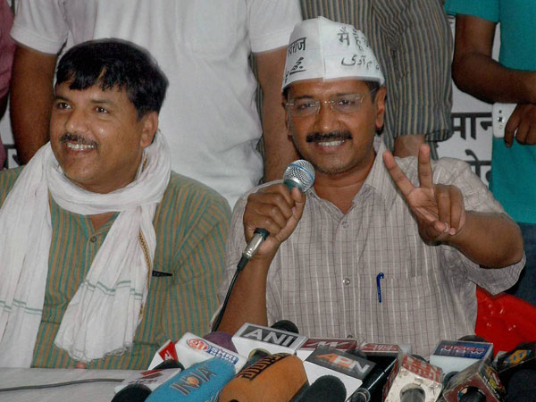 rvind Kejriwal with Sanjay Singh addressing a press conference
