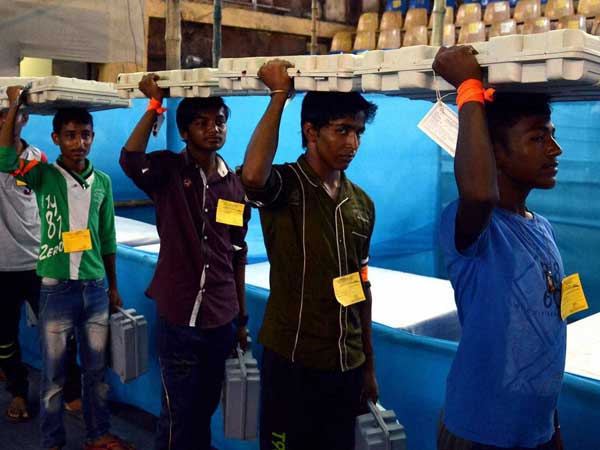 EVMs being delivered to polling officials