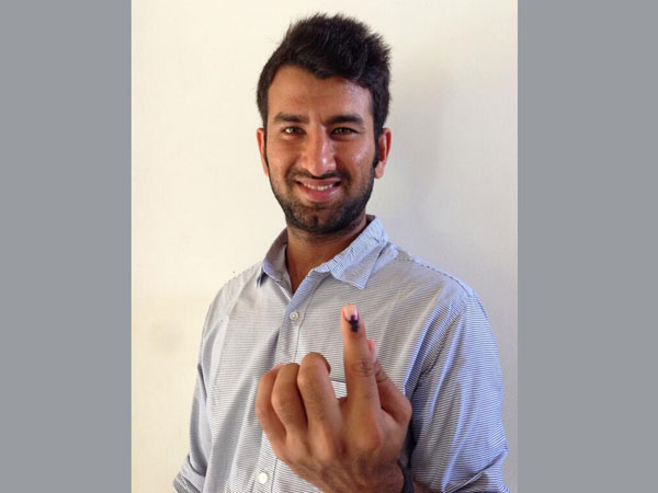 Cricketer Cheteshwar Pujara casts his vote from Rajkot