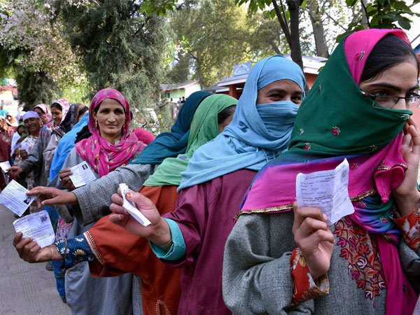 People wait to cast their vote