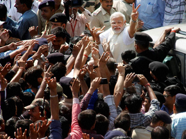 Narendra Modi shows victory sign