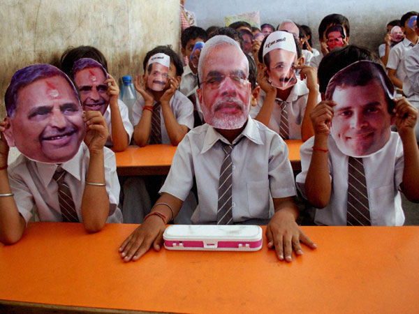School children, wearing masks of various political learders