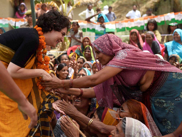 Priyanka Vadra meets villagers during an election campaign