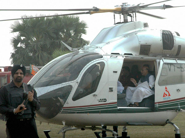 Rajnath Singh leaves after an election campaign