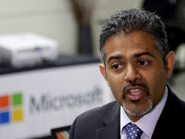 Microsoft Vice President Sanket Akerkar talks to a reporter