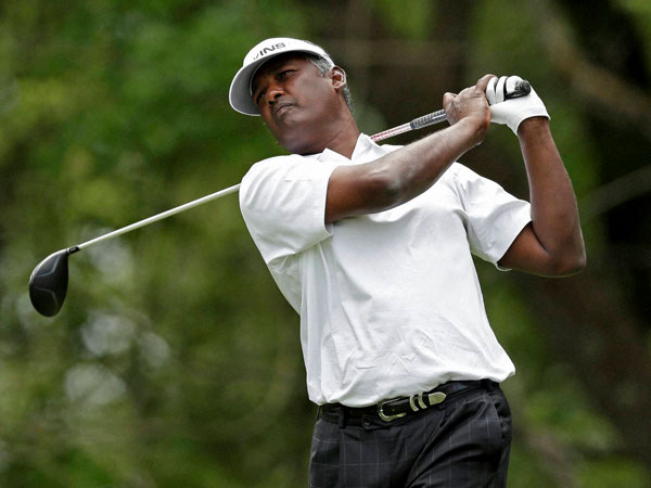 Vijay Singh, of Fiji, watches his tee shot