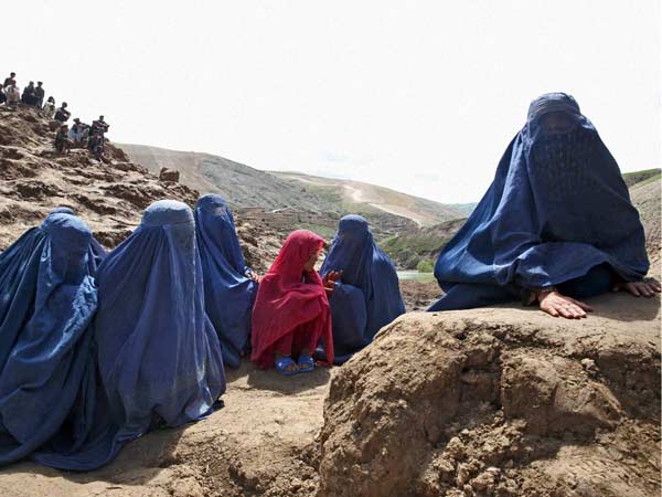 Survivors pray for their loved ones 