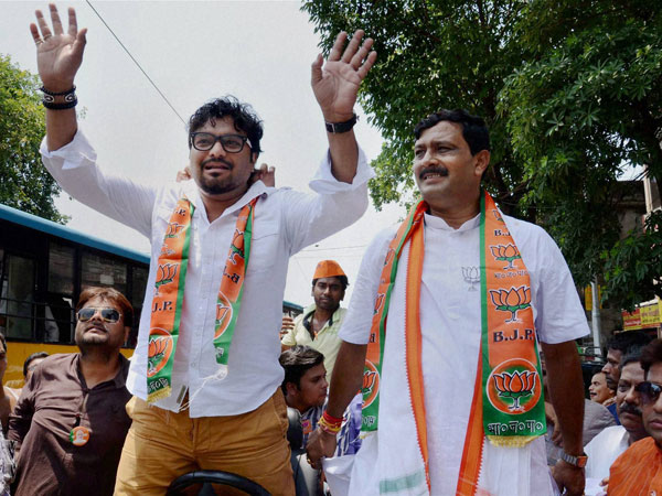 Singer Babul Supriyo waves during an election campaign