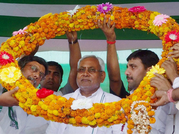 Nitish Kumar is garlanded by JD-U leaders
