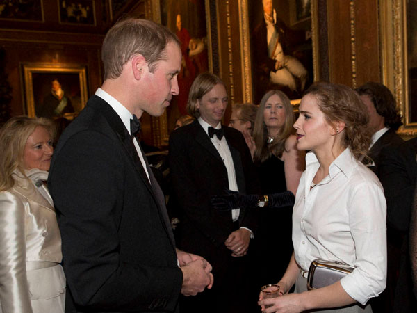 Prince William, Duke of Cambridge, speaks with Emma Watson 