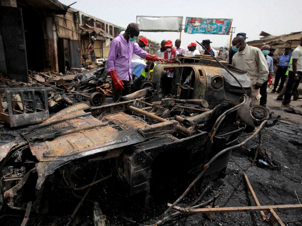 Rescue workers search for remains at the site 