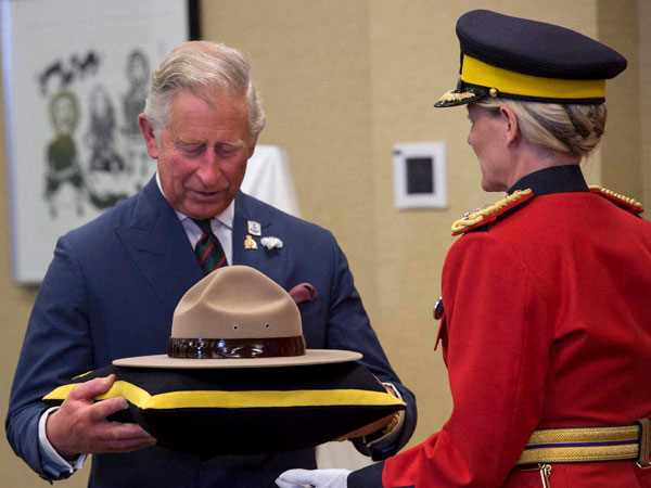Prince Charles is presented with a Stetson