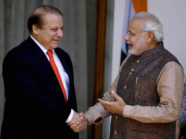 Prime Minister Narendra Modi, right, shakes hand with his Pakistani counterpart Nawaz Sharif