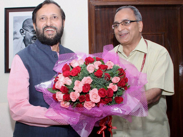 Prakash Javadekar receives a bouquet while assuming charge as Minister of State