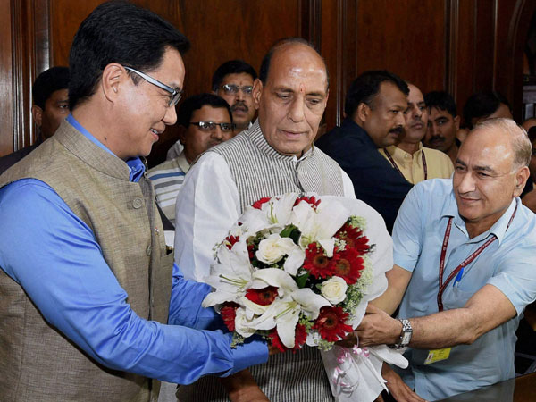 ome Minister Rajnath Singh is greeted by MoS Kiren Rijiju 