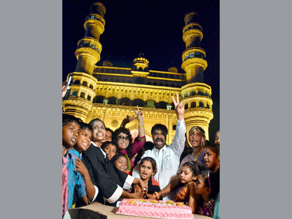 People celebrate Telangana formation day front of Historic Charminar