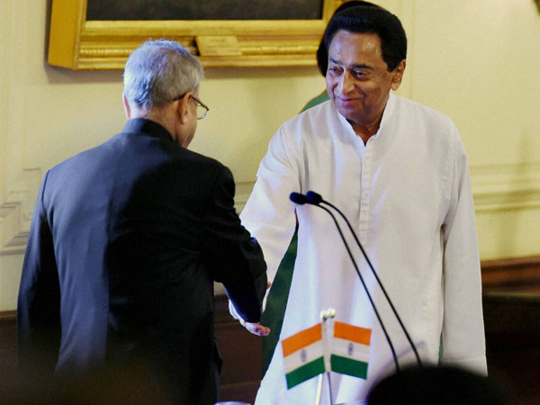 Senior Congress leader Kamal Nath shakes hand with President Pranab Mukherjee Senior Congress leader Kamal Nath shakes hand with President Pranab Mukherjee