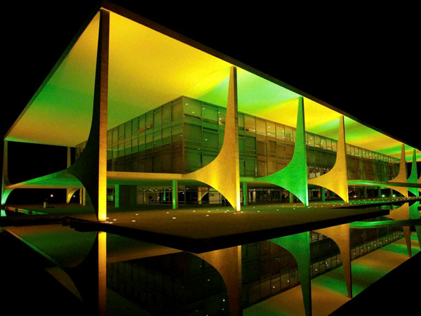 The Planalto presidential palace is illuminated in Brazil's national color