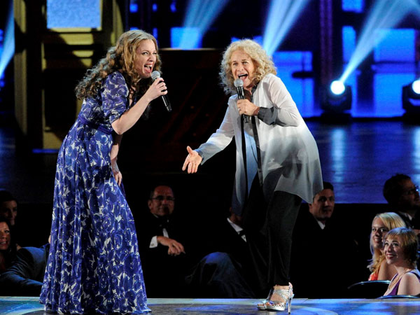 Carole King, right, singing with the cast of the show 