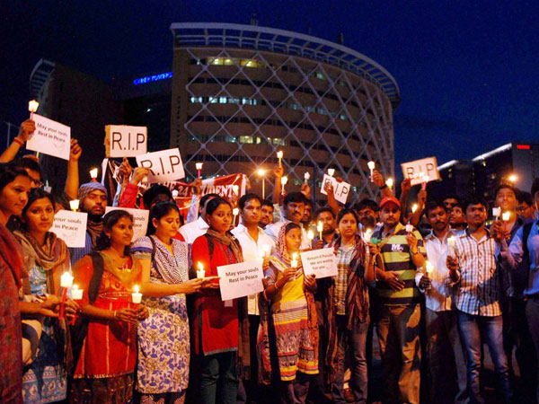 IT professionals & students take part in a candle light march