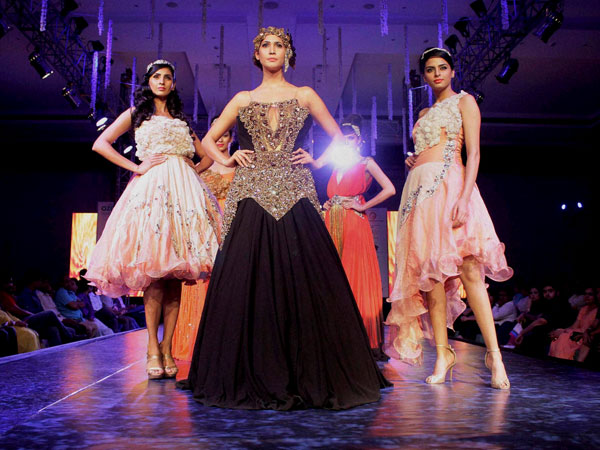 Models walk the ramp during a fashion Show in Jaipur 