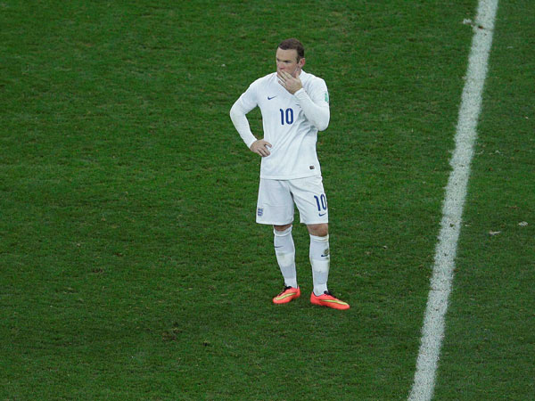 England's Wayne Rooney reacts during the group D World Cup soccer match