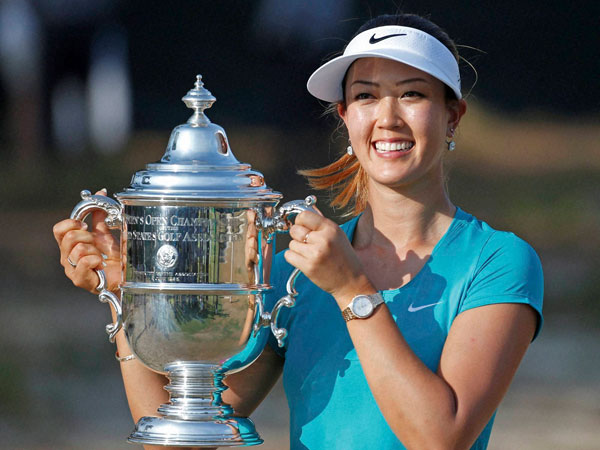 Wie poses with her trophy 