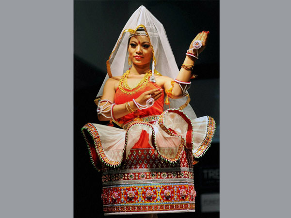 A model walks the ramp during a fashion event