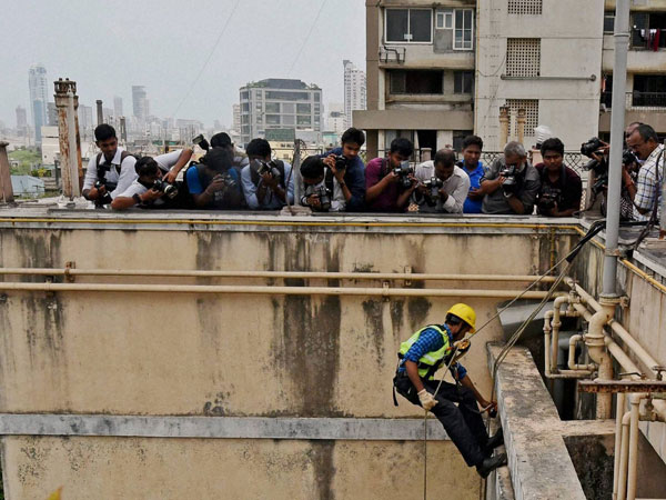 Mahanagar gas officials disconnect the gas connection