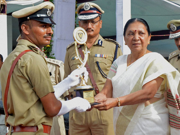 Gujarat chief minister Anandiben Patel presents an award 