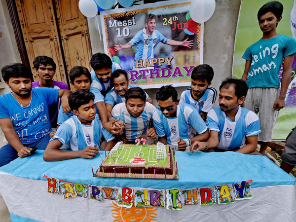 Fans celebrate the birthday of Argentina soccer star Lionel Messi