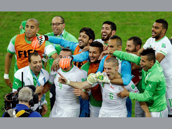 Algeria players celebrate following the group H World Cup soccer match