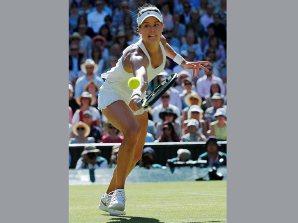 Bouchard returns to Halep