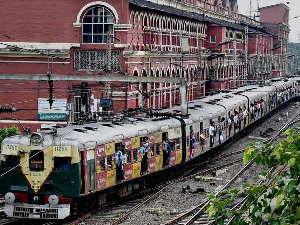 A local train arrives at a platform of Sealdah Station