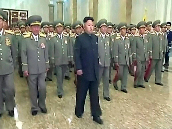 North Korean leader Kim Jong Un, center, visits Kumsusan Palace