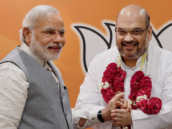 Prime Minister Narendra Modi with newly elected BJP President Amit Shah